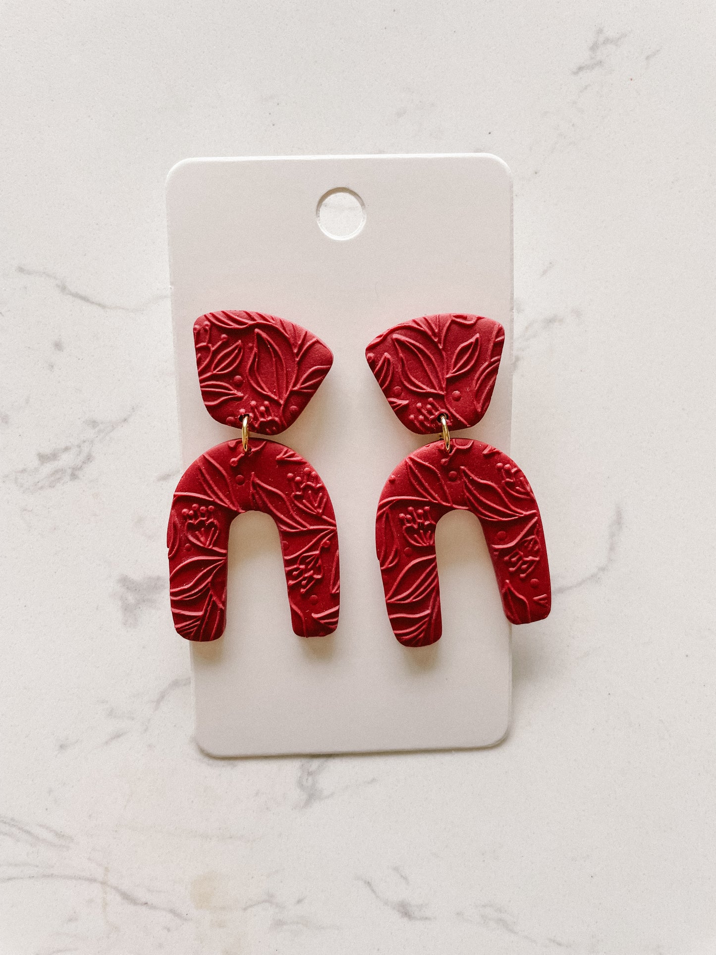 Neutral Red Arch Polymer Clay Earrings With Embossed Floral Detail